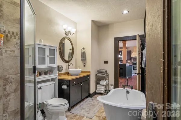 a outdoor living space with furniture and a fireplace