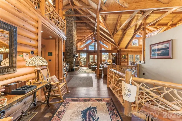 a view of a living room and kitchen
