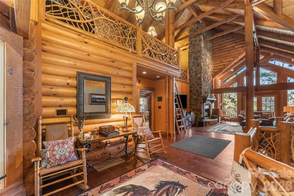 a view of a patio with table and chairs