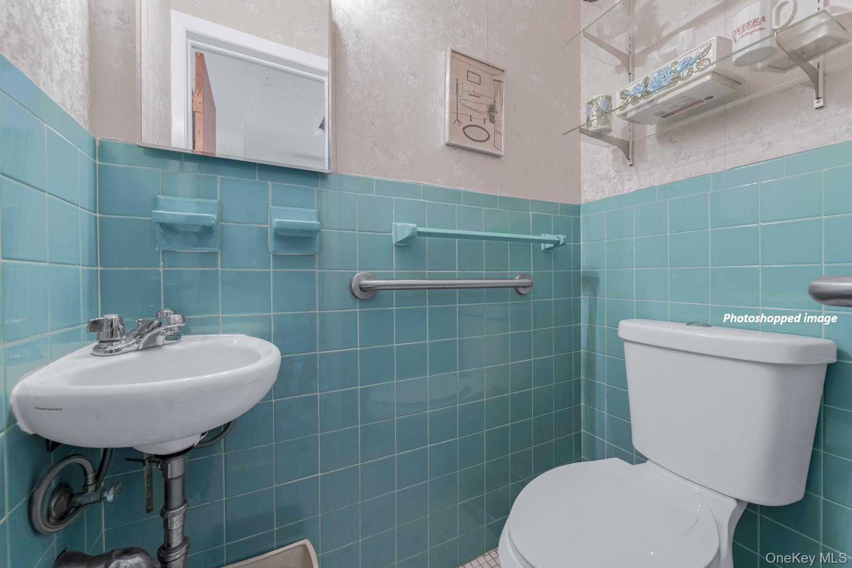 331 Richmond Road Queens, NY 11363 - Photo 13 of 26 a bathroom with a sink toilet and a mirror