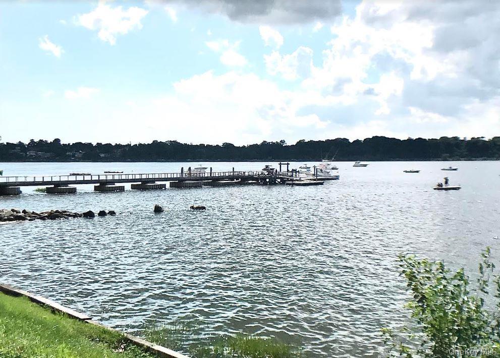 331 Richmond Road Queens, NY 11363 - Photo 16 of 26 a view of lake with mountain