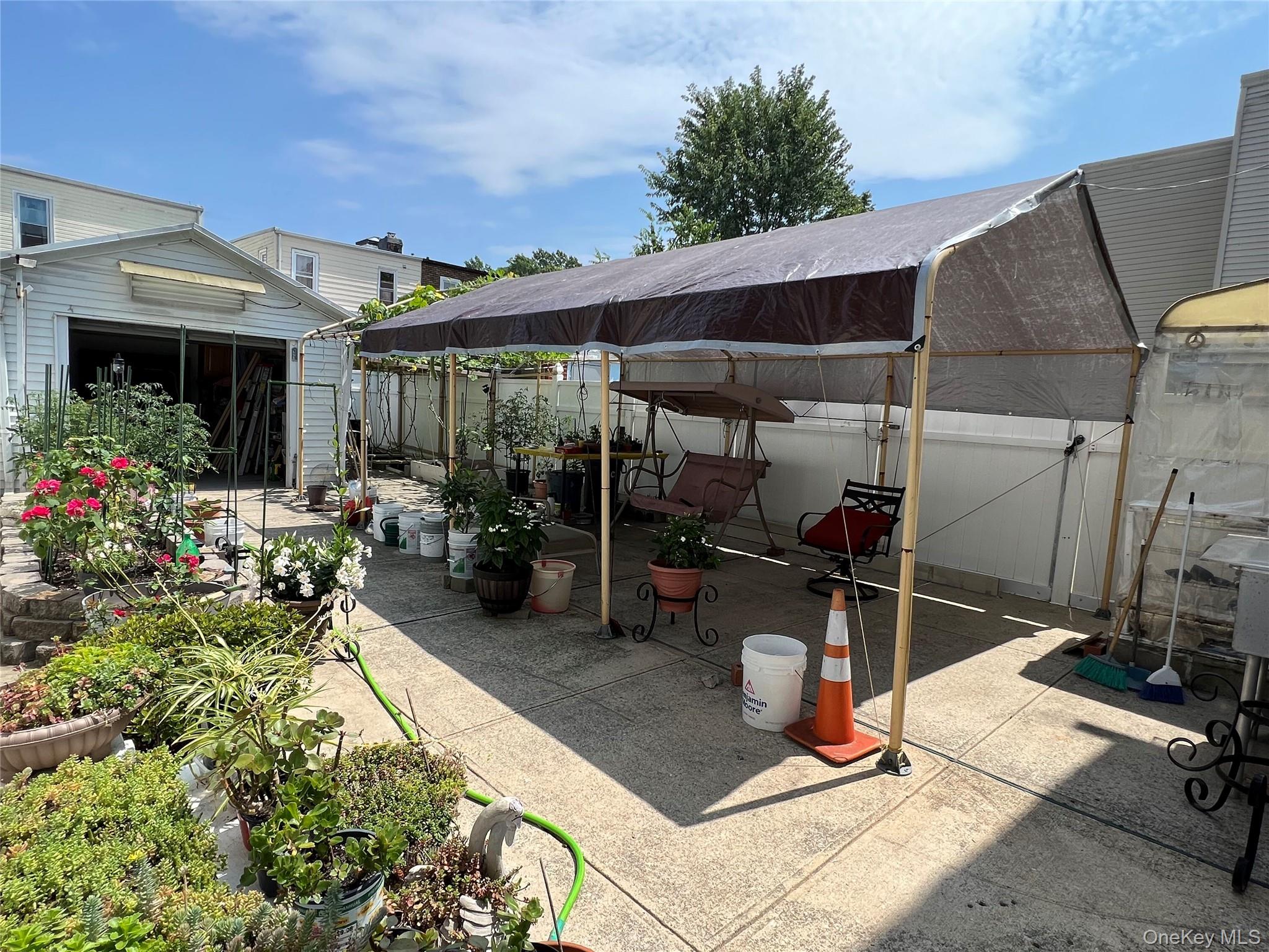 90-11 75th Street Queens, NY 11421 - Photo 10 of 10 View of patio / terrace