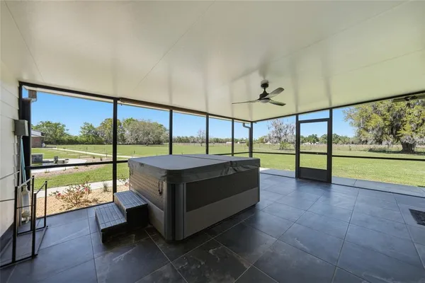 a view of a house with a big yard