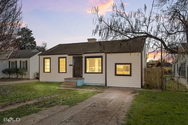 a front view of house with yard