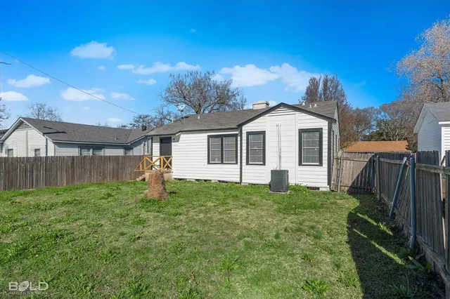 a front view of a house with yard