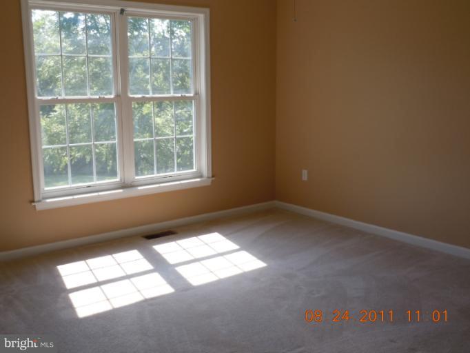 9065 Rixeyville Road Rixeyville, VA 22737 - Photo 1 of 12 an empty room with a window