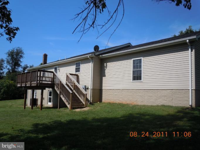 9065 Rixeyville Road Rixeyville, VA 22737 - Photo 2 of 12 a view of a house with a yard