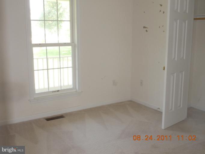 9065 Rixeyville Road Rixeyville, VA 22737 - Photo 11 of 12 an empty room with a window