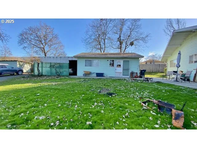 a black and white photo of a house