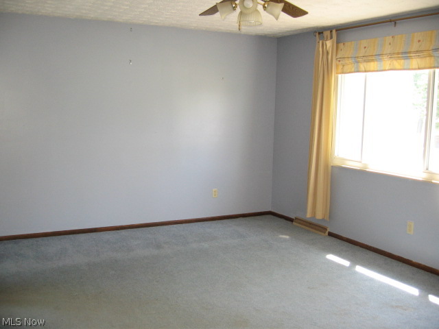 455 Broadview Road Tallmadge, OH 44278 - Photo 5 of 25 LIV RM VIEW 2 - ALL WINDOWS HAVE BEEN REPLACED - LARGE FRONT WINDOW FOR NATURAL LIGHT