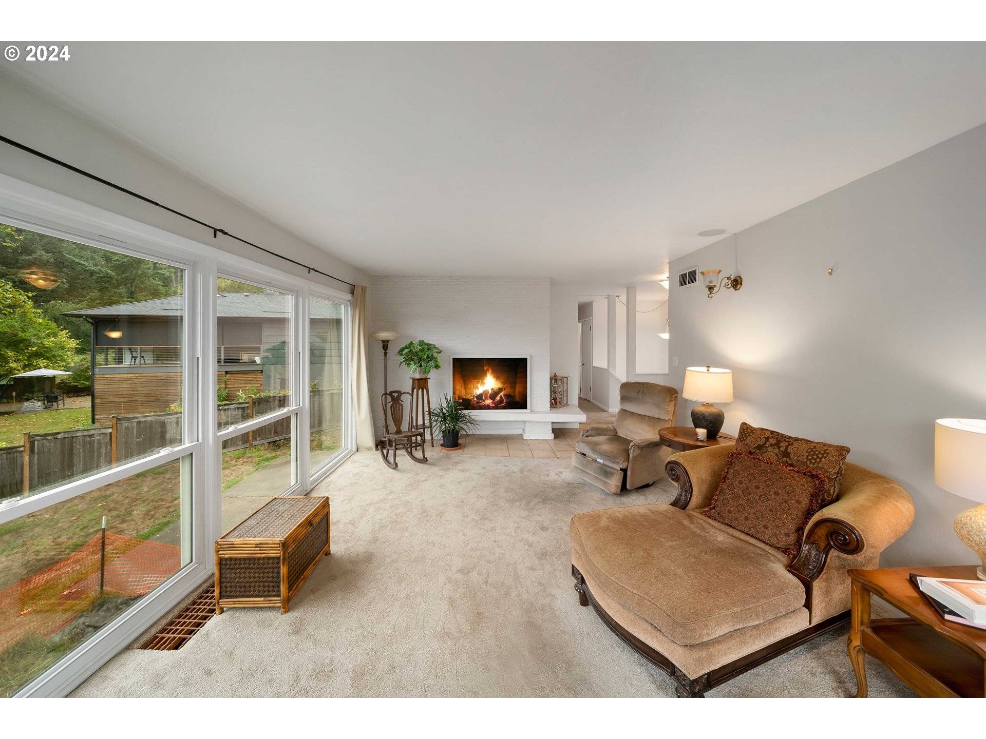 4425 Southwest Dosch Road Portland, OR 97239 - Photo 15 of 40 a living room with furniture and a flat screen tv
