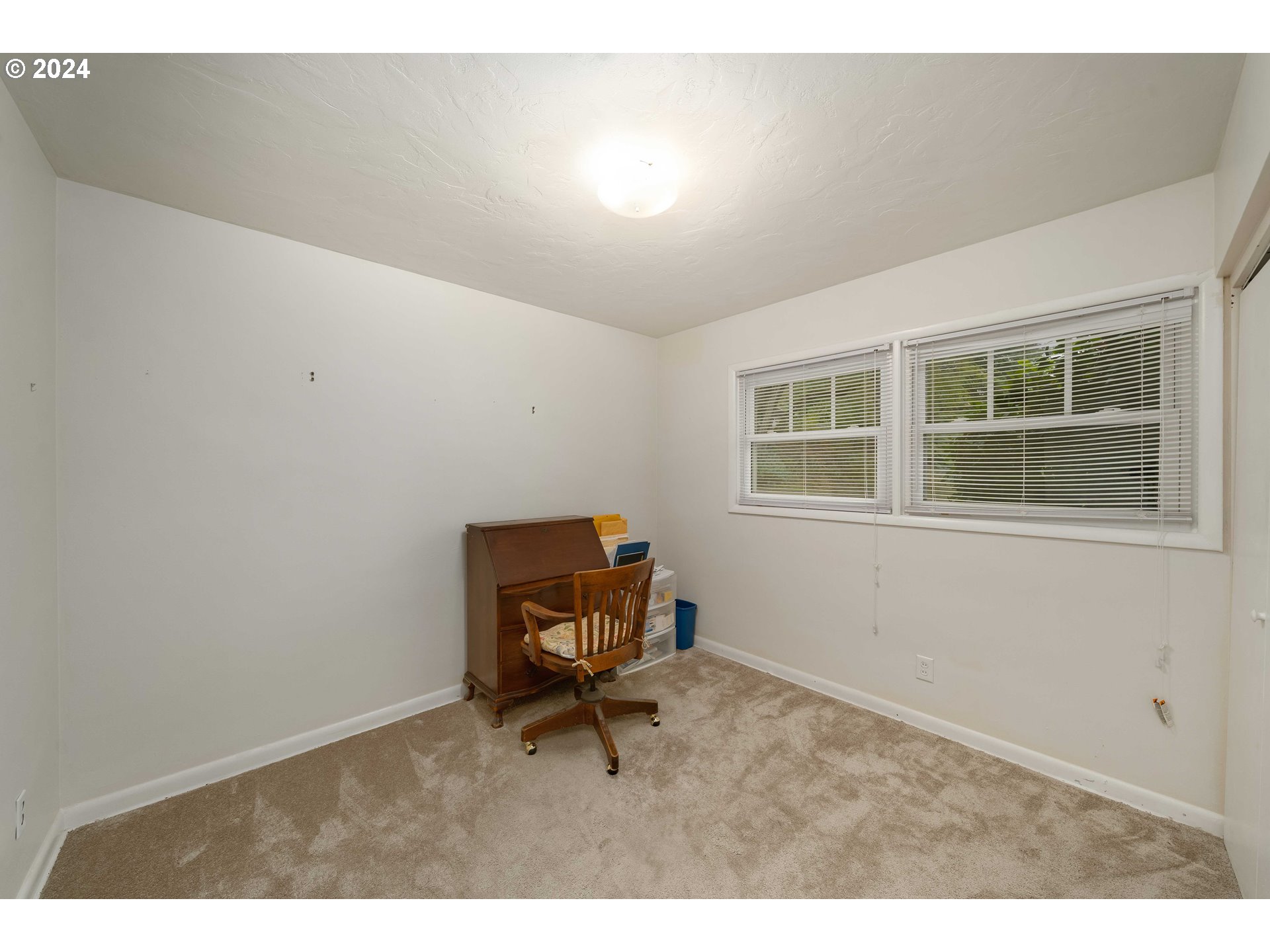 4425 Southwest Dosch Road Portland, OR 97239 - Photo 26 of 40 a room with workspace