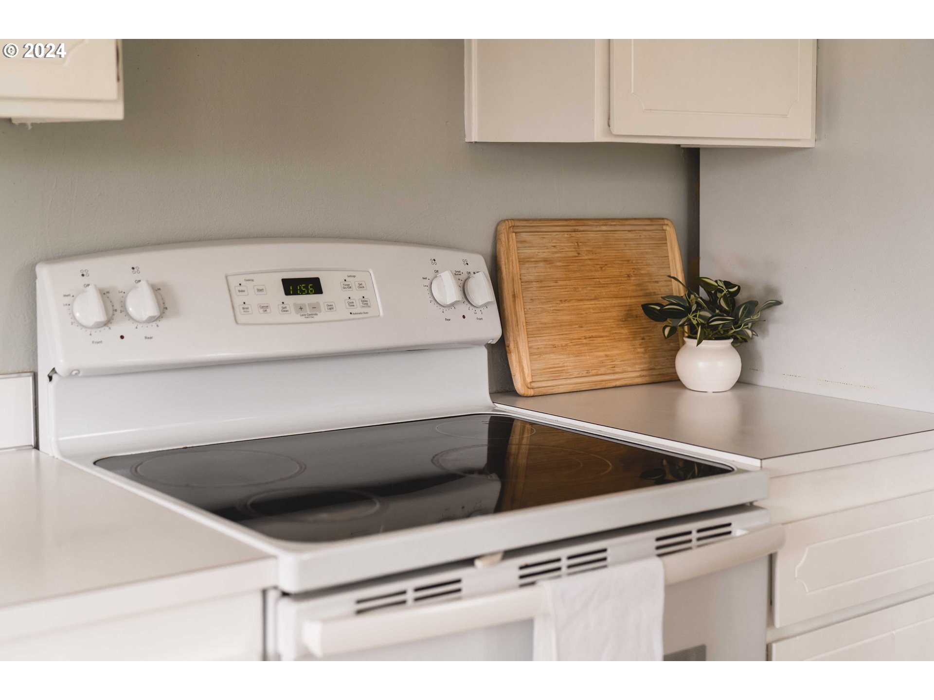 4425 Southwest Dosch Road Portland, OR 97239 - Photo 10 of 40 a kitchen with a sink and cabinets