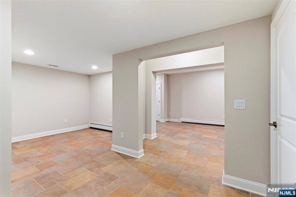 767 Orangeburgh Road River Vale, NJ 07675 - Photo 40 of 49 an empty room with a natural light