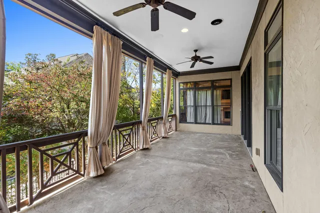 a spacious bathroom with a granite countertop sink and a mirror