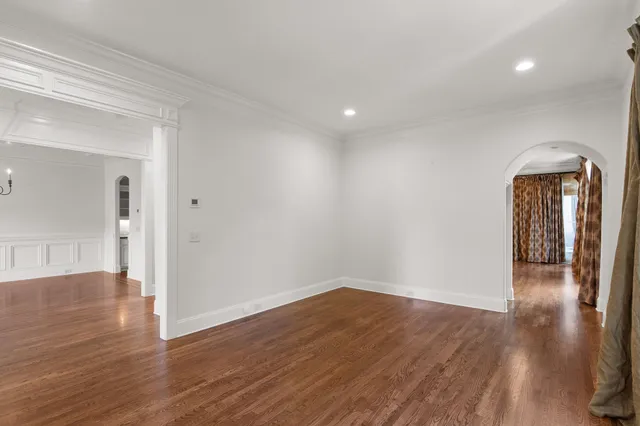 a living room with furniture fireplace and flat screen tv