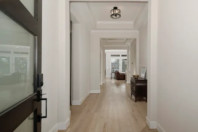 a view of a livingroom from a hallway