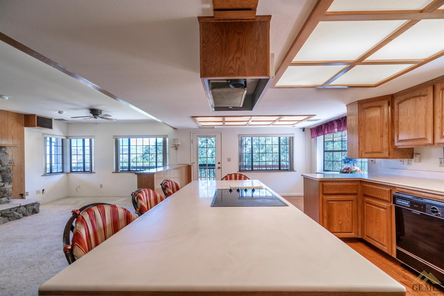 Undisclosed Address Tehachapi, CA 93561 - Photo 18 of 44 a large white kitchen with a large window