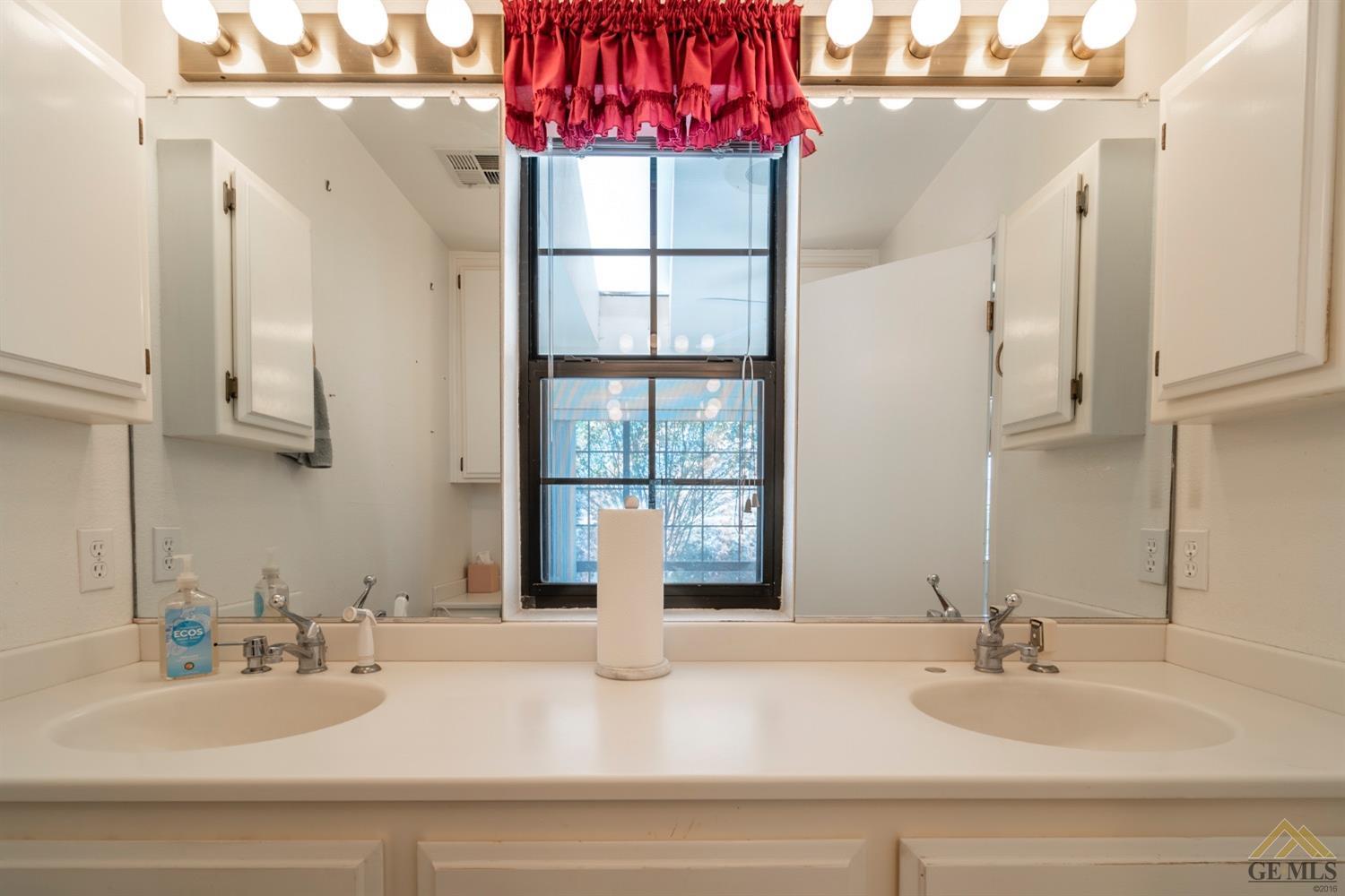 Undisclosed Address Tehachapi, CA 93561 - Photo 28 of 44 a bathroom with a sink and a mirror
