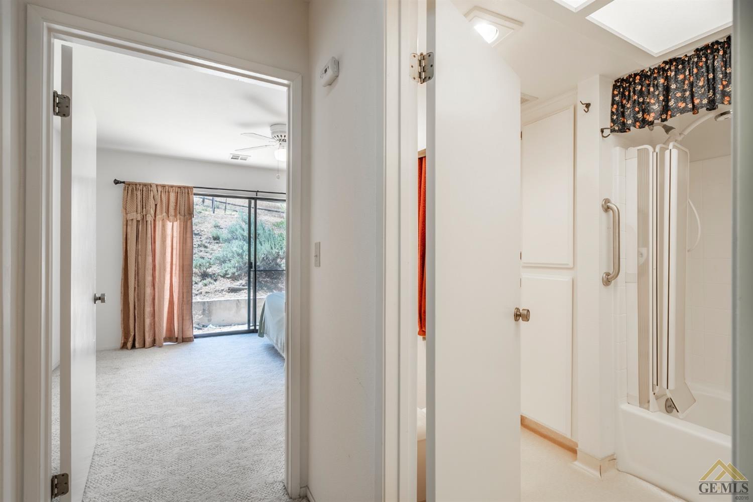 Undisclosed Address Tehachapi, CA 93561 - Photo 32 of 44 a view of a bathroom with a shower and a sink