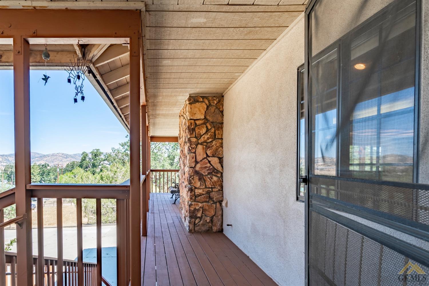 Undisclosed Address Tehachapi, CA 93561 - Photo 39 of 44 a view of a balcony with wooden floor