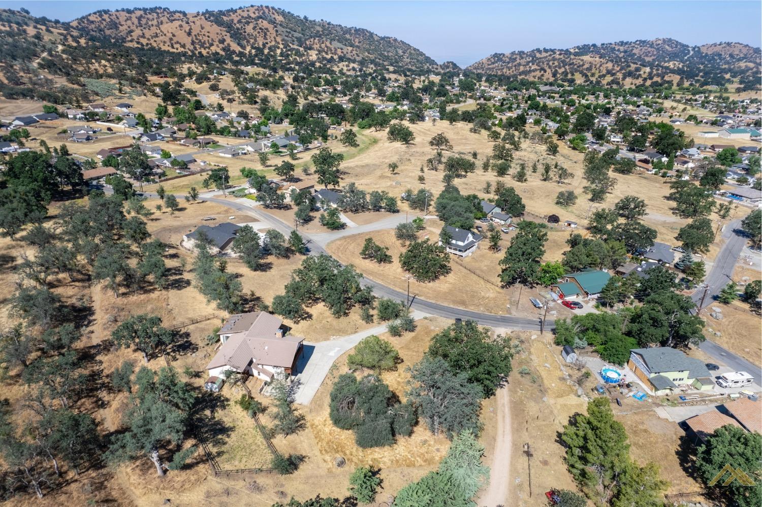 Undisclosed Address Tehachapi, CA 93561 - Photo 44 of 44 an aerial view of a houses with a yard