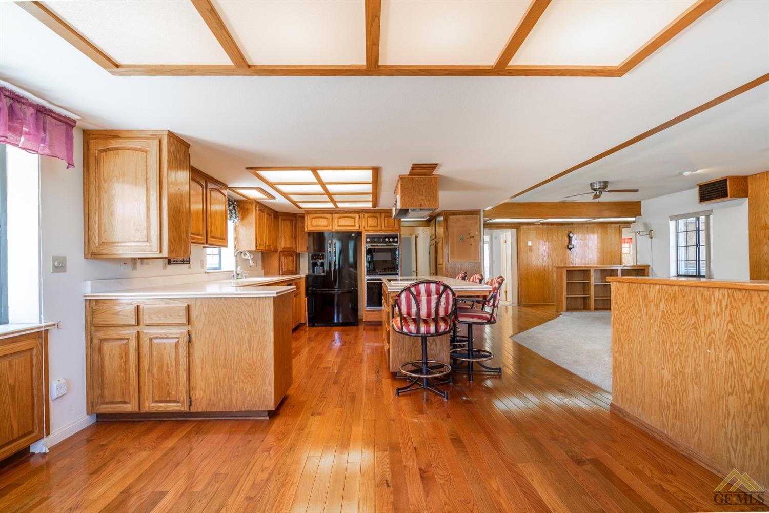 Undisclosed Address Tehachapi, CA 93561 - Photo 10 of 44 a dining room with furniture and wooden floor