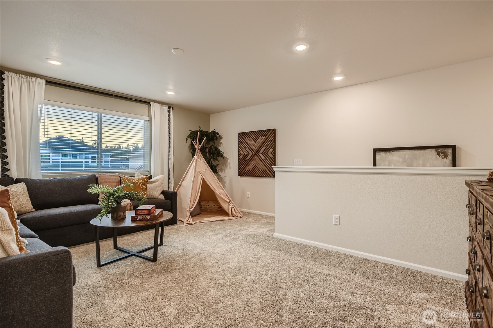 1212 15th Avenue Sultan, WA 98294 - Photo 8 of 19 a living room with furniture and a floor to ceiling window