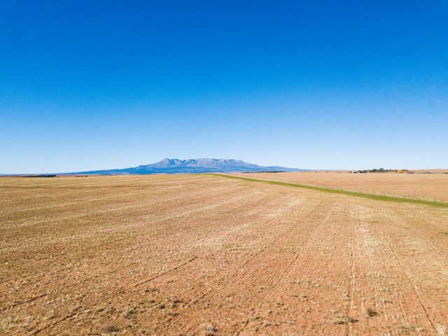 100 South Pearson Cutoff Road Monticello, UT 84535 - Photo 8 of 9 View of mountain backdrop featuring rural landscape
