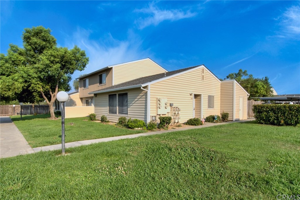 631 North Street Corning, CA 96021 - Photo 11 of 45 a view of a house with a backyard
