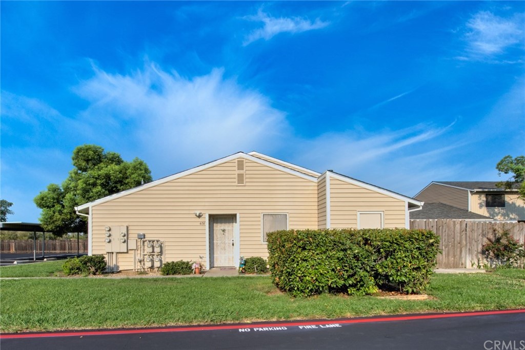 631 North Street Corning, CA 96021 - Photo 15 of 45 a front view of a house with a yard