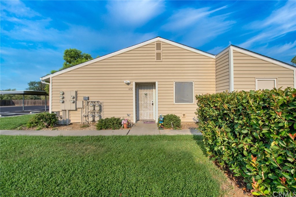 631 North Street Corning, CA 96021 - Photo 16 of 45 a front view of house with yard and green space