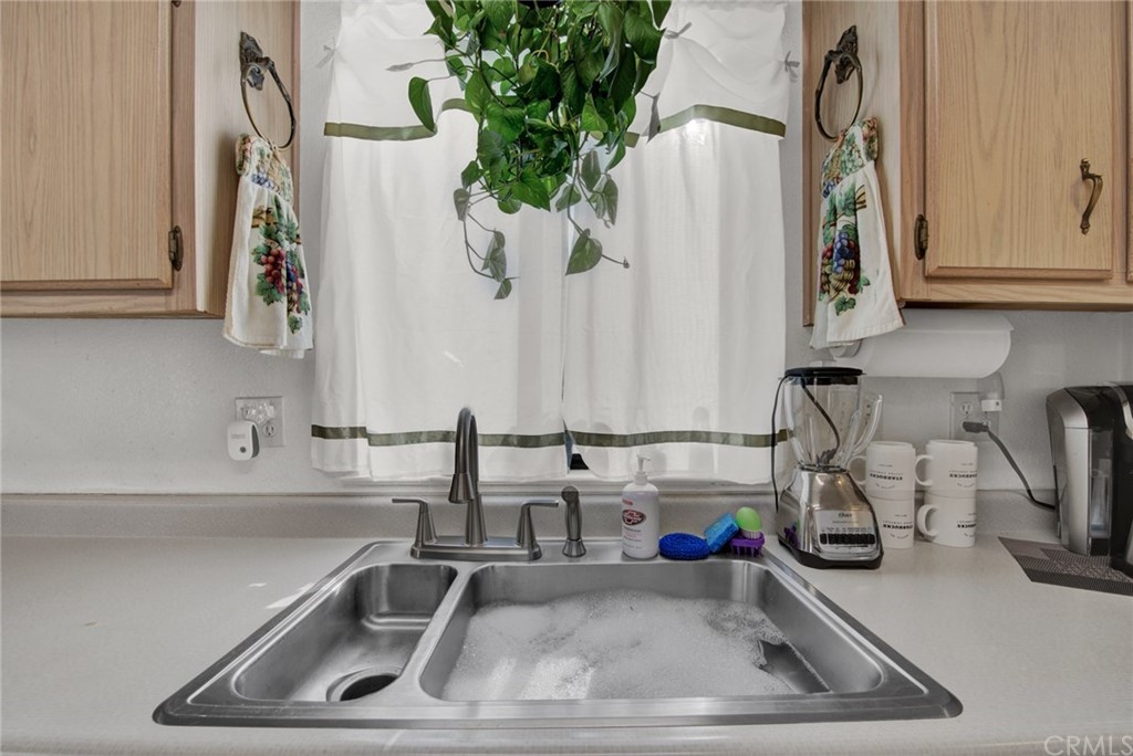 631 North Street Corning, CA 96021 - Photo 20 of 45 a bathroom with mirror and sink