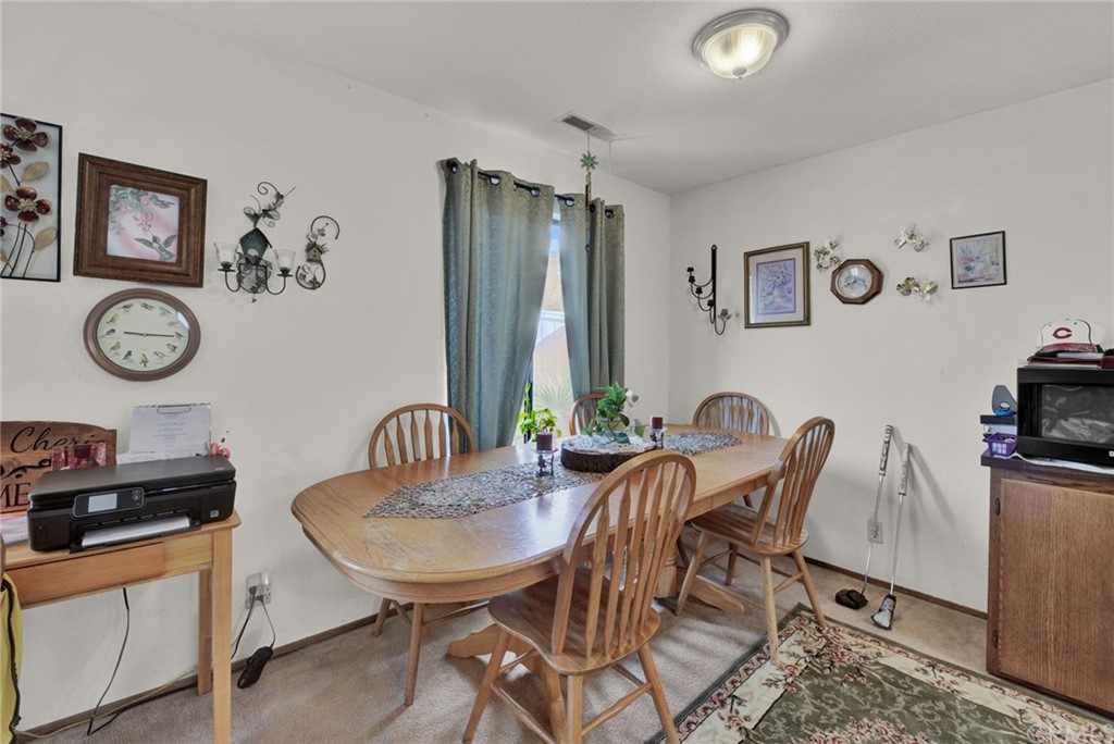 631 North Street Corning, CA 96021 - Photo 26 of 45 a view of a dining room with furniture