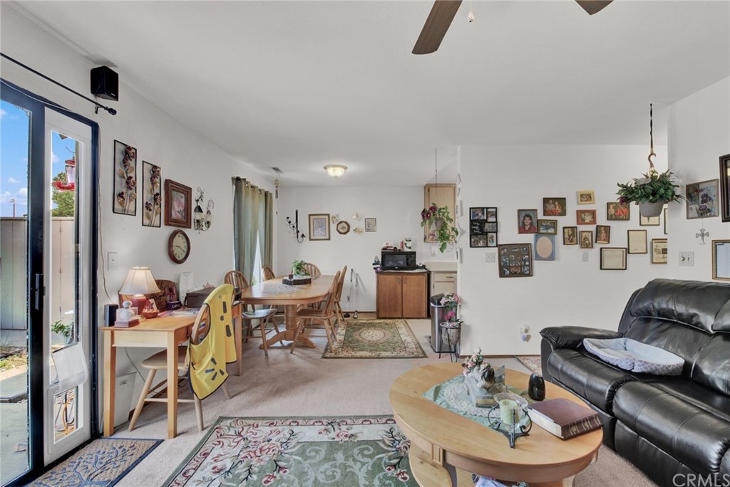 631 North Street Corning, CA 96021 - Photo 31 of 45 a living room with furniture and a table