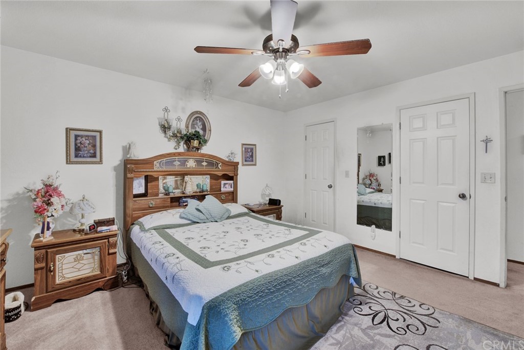 631 North Street Corning, CA 96021 - Photo 35 of 45 a living room with a bed and a table
