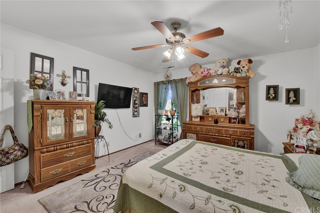 631 North Street Corning, CA 96021 - Photo 36 of 45 a living room with furniture and a flat screen tv