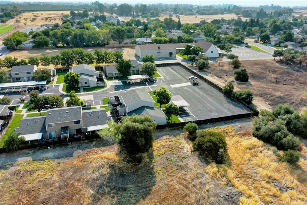 631 North Street Corning, CA 96021 - Photo 38 of 45 an aerial view of a house with yard swimming pool and lake view