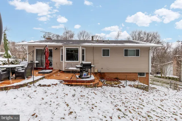 a view of a backyard with a patio