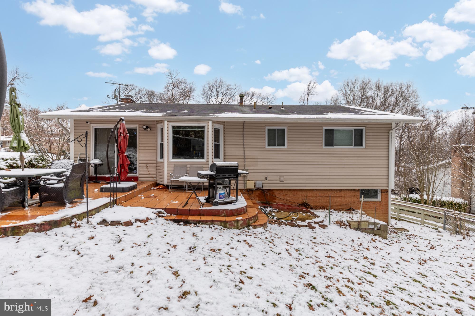 1513 Menlee Drive Silver Spring, MD 20904 - Photo 16 of 19 a view of a backyard with a patio