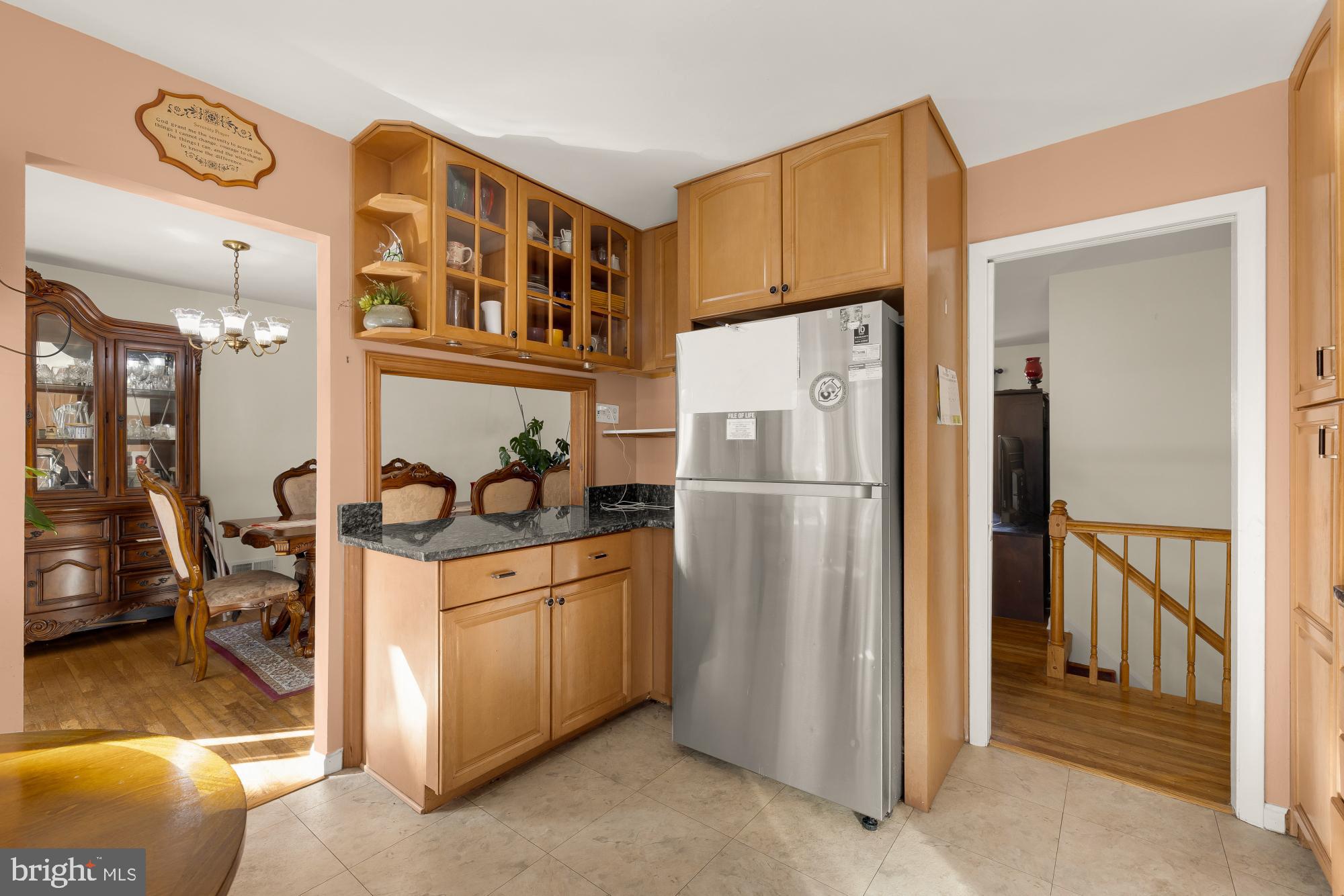 1513 Menlee Drive Silver Spring, MD 20904 - Photo 8 of 19 a kitchen with stainless steel appliances granite countertop a refrigerator and a stove