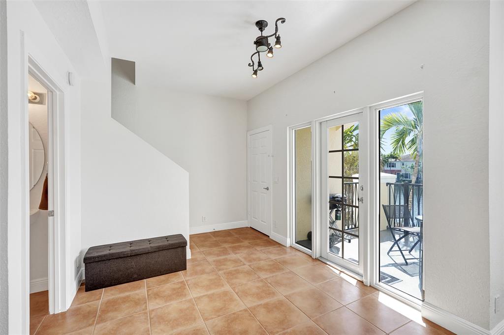 228 Southwest 6th Court Pompano Beach, FL 33060 - Photo 29 of 50 an empty room with windows