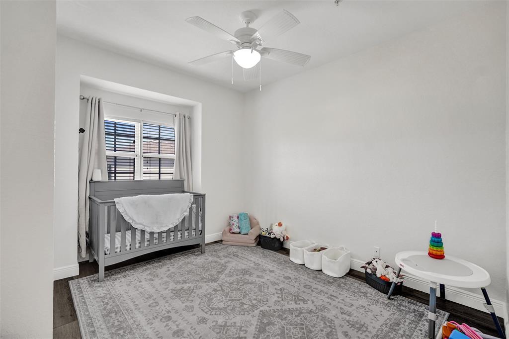 228 Southwest 6th Court Pompano Beach, FL 33060 - Photo 33 of 50 a living room with baby crib furniture and a window
