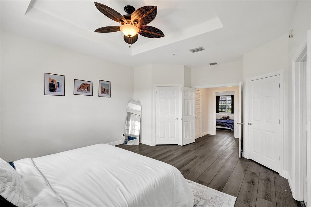 228 Southwest 6th Court Pompano Beach, FL 33060 - Photo 40 of 50 a bedroom with a bed and a ceiling fan