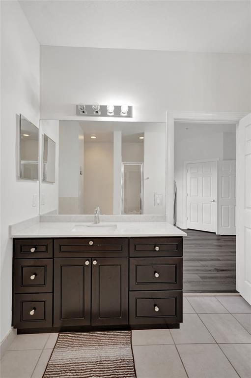 228 Southwest 6th Court Pompano Beach, FL 33060 - Photo 43 of 50 a bathroom with a sink and a mirror