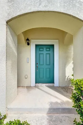 a front view of a house with a garage