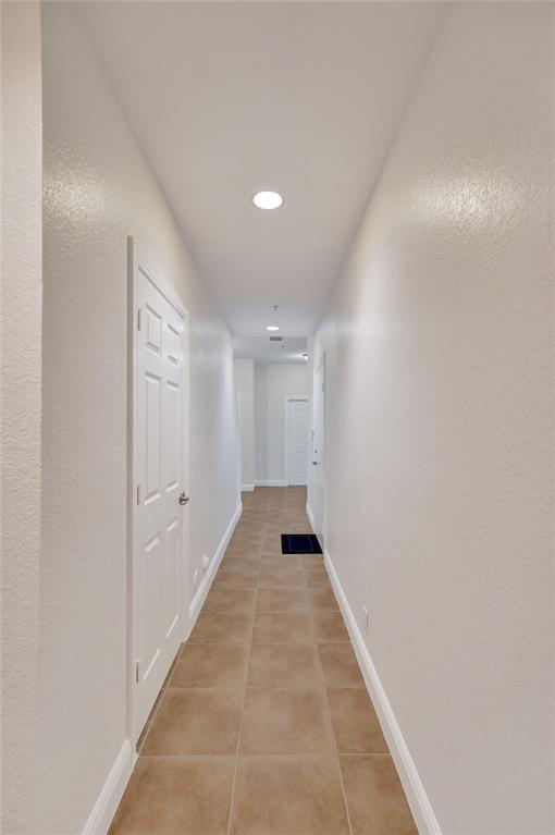 228 Southwest 6th Court Pompano Beach, FL 33060 - Photo 6 of 50 a view of a hallway with wooden floor