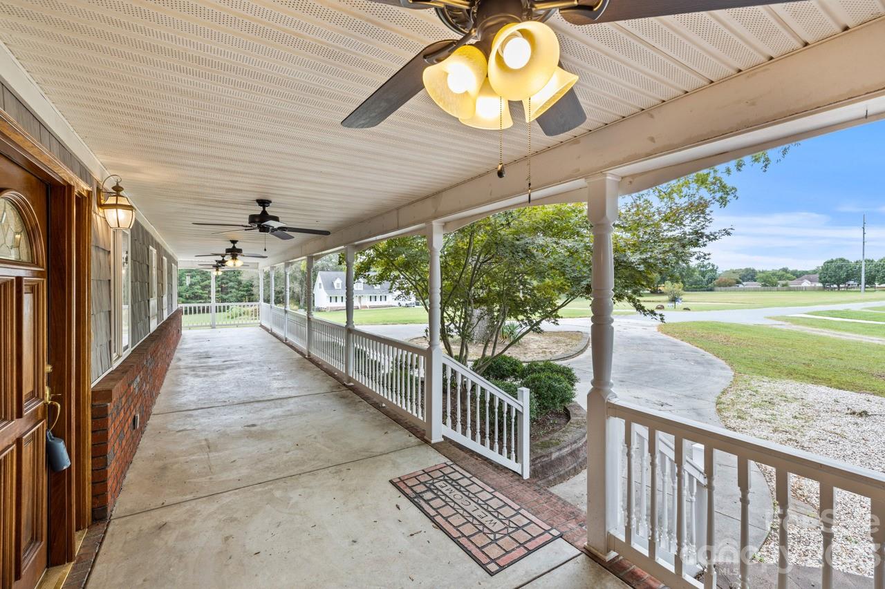 2218 Goldmine Road Monroe, NC 28110 - Photo 33 of 42 a view of a porch with wooden floor