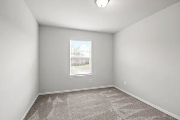 an empty room with closet