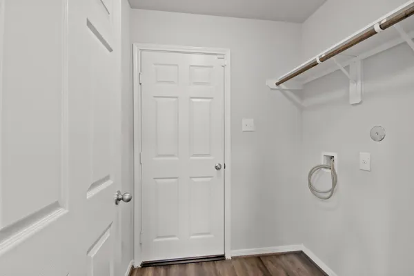 a view of a hallway with closet